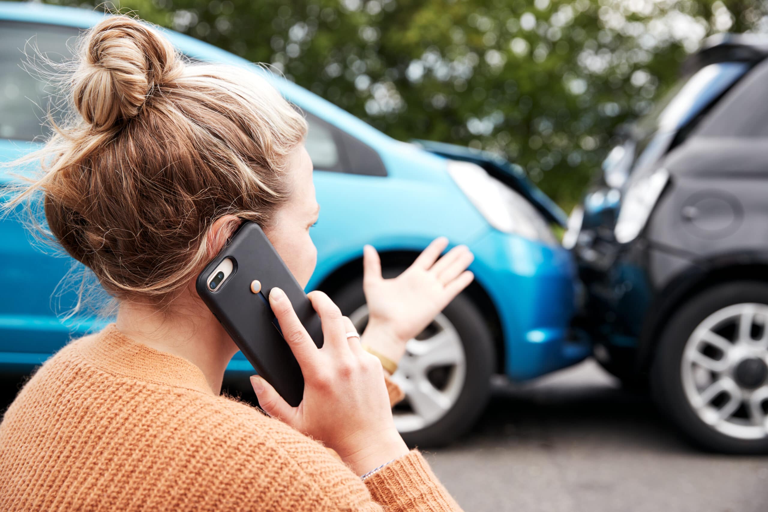 Female Motorist Involved In Car Accident Calling Insurance Company to Make a Claim