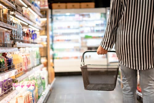 Shopper in a grocery store - Companies should identify key purchasing criteria as part of their primary research