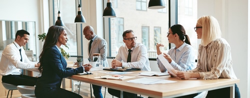 Group of diverse colleagues working in an office setting